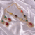 Navratna Carved Ruby & Emerald Polki Earrings | Santosh Ji Jewellers Moradabad