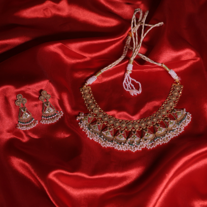 Traditional meenakari choker with pearl details — a masterpiece of timeless elegance.